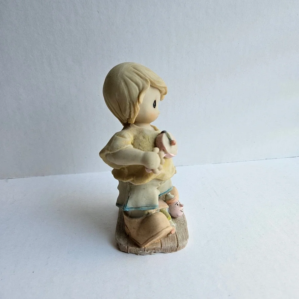 Vintage Style Boy Playing Paddle Ball Resin Figurine Collectible Home Decor